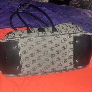 New dooney and Burke purse and wristlet with cover, certificate of authenticity